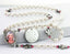 White pearl and pink birthstone Angel memorial rosary beads with photo center and engraved disc.