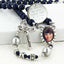 Dark blue and grey men's rosary with a photo center an engraved disc and name in beads.