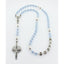 Personalized light blue and white boy’s first communion rosary with a name in beads.