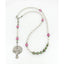 Girl’s white, pink and green first communion rosary with a name in beads.