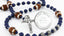 Blue football sports rosary with a first communion engraved disc and a name in beads.