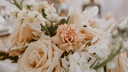 Bouquet of white and peach colored flowers. -desktop