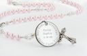 Personalized pink and crystal rosary with engraved disc for girl's baptism gift. 