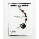 Boy’s dark blue baptism rosary with footballs in Charming Rosary gift box with card message.