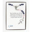 Dark blue and pink girl’s baptism rosary in Charming Rosary gift box with card message.