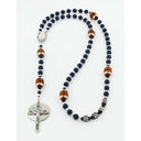 Dark blue rosary, personalized with footballs and a name in beads.
