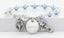 Light blue pearl and crystal rosary bracelet with an engraved disc and charms for bridesmaids.