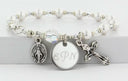 White pearl and crystal rosary bracelet with an engraved disc and charms for bridesmaids.
