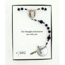 Dark blue memorial rosary beads with photo centerpiece in Charming Rosary gift box.