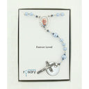 Light blue memorial rosary beads with photo centerpiece and engraved disc in Charming Rosary gift box.