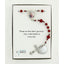 Red memorial rosary beads with photo centerpiece and engraved disc in Charming Rosary gift box.