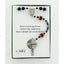 Men's rosary with dark blue pearls, golf balls and Dad in beads. In a Charming Rosary gift box with card message.