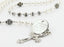 Custom white and silver confirmation rosary, with an engraved disc, and a name in beads