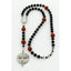 Boy’s black baptism rosary with basketballs and a name in beads.