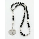 Personalized black and white boy’s baptism rosary with a name in beads.