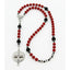 Personalized red and black boy’s baptism rosary with a name in beads.