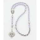 Lavender fancy girl’s baptism rosary with a name in beads.