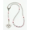 Personalized light blue pearl and pink crystal girl’s baptism rosary with a name in beads.