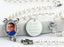 White pearl Angel memorial rosary beads with photo center and engraved disc.