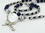 Custom men's rosary with dark blue and grey pearls, multiple names in beads and an engraved disc.