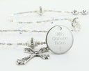 Quinceanera rosary with rystals and crystal lined pearls has an engraved disc for a girl's quinceanera gift. 