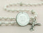 White pearl and crystal lined pearl wedding rosary with an engraved disc for a bridal bouquet. 