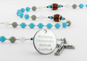 Custom Detroit football rosary with blue, grey and white beads and an engraved disc. 