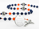 Custom Detroit baseball rosary with dark blue and orange beads and an engraved disc. 