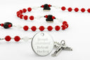 Custom Detroit hockey rosary with red and white beads and an engraved disc. 