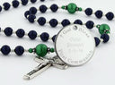 Custom dark blue and green first communion rosary, with an engraved disc for a boy’s communion gift.