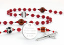 Custom red multi-sport first communion rosary with an engraved disc.