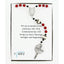 Red first communion rosary with black baseballs. In Charming Rosary gift box with card message.