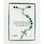 Dark blue and green boy’s first communion rosary with engraved disc in Charming Rosary gift box with card message.