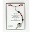 Red and black boy’s first communion rosary in Charming Rosary gift box with card message.