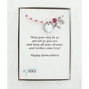 Pink pearl and crystal rosary bracelet with an engraved disc and charms in a Charming Rosary gift box with card message. 