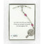 Girl’s white, pink and green first communion rosary in Charming Rosary gift box with card message.