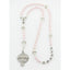 Girl’s pink first communion rosary with crystal lined pearls and a name in beads.