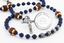 Custom dark blue first communion rosary with footballs, an engraved disc, and a name in beads.