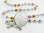 Multiple color birthstone personalized rosary with engraved disc and Mom in beads. 