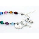 Multiple color birthstone rosary bracelet with an engraved disc and charms. 
