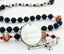 Dark blue and red baptism rosary with baseballs and an engraved disc, for a boy’s baptism gift.