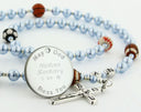 Light blue baptism rosary with multiple sports beads and an engraved disc, for a boy’s baptism gift.