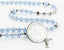 Custom light blue pearl and crystal baptism rosary, with an engraved disc for a boy’s baptism gift.