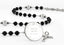 Custom black and grey baptism rosary, with an engraved disc for a boy’s baptism gift.