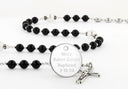 Custom black and white baptism rosary, with an engraved disc for a boy’s baptism gift.