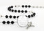 Custom black and white baptism rosary, with an engraved disc for a boy’s baptism gift.