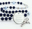 Custom dark blue and light blue baptism rosary, with an engraved disc for a boy’s baptism gift.