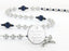 Custom grey and dark blue baptism rosary, with an engraved disc for a boy’s baptism gift.