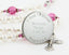 White baptism rosary with pink crystals and an engraved disc, for a girl’s baptism gift.