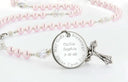 Custom pink and sparkly crystal baptism rosary, with an engraved disc for a girl’s baptism gift
